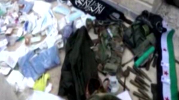 Сирийские военные захватили оружие и форму террористов в Тель-Скеке - Sputnik Кыргызстан