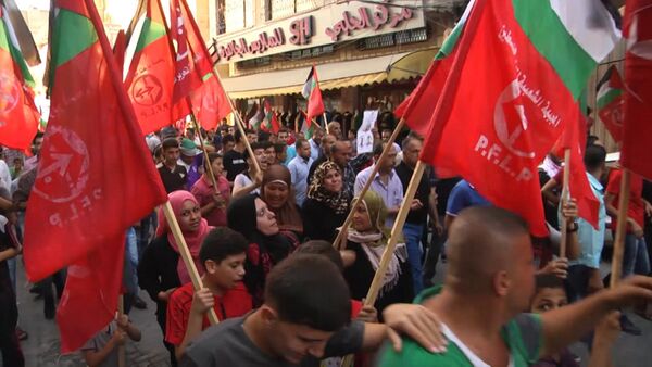 Палестинцы на марше в Джебалии требовали остановить насилие со стороны Израиля - Sputnik Кыргызстан