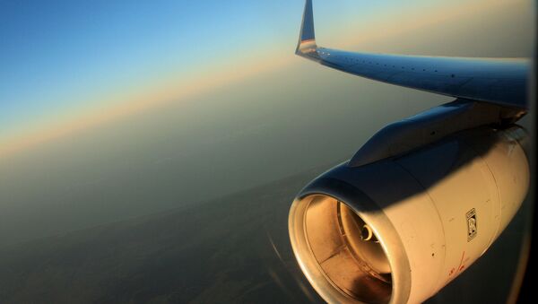 Крыло самолета во время полета. Архивное фото - Sputnik Кыргызстан