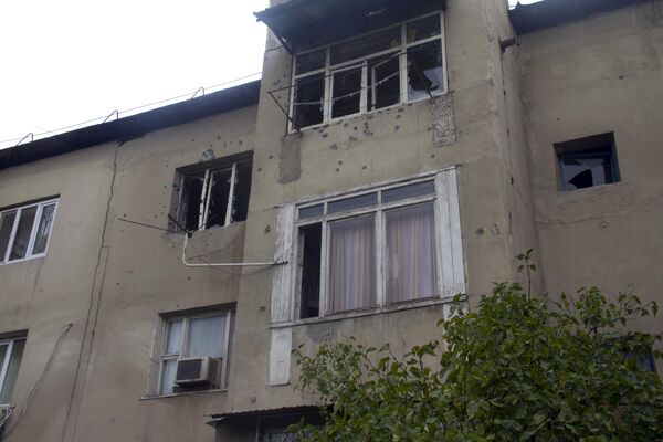 Окна на квартиру где отстреливался заключенный Итибаев и проводилась спецоперация. Архивное фото - Sputnik Кыргызстан