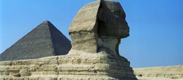 Пирамиды и Большой сфинкс в Гизе. Архивное фото - Sputnik Кыргызстан