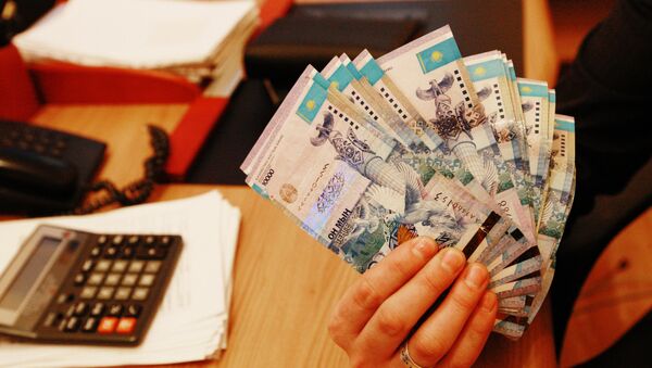 Тенге - национальная валюта Казахстана. Архивное фото - Sputnik Кыргызстан