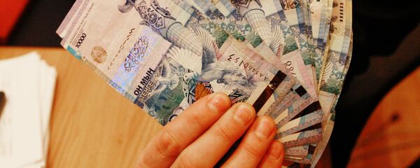 Тенге - национальная валюта Казахстана. Архивное фото - Sputnik Кыргызстан