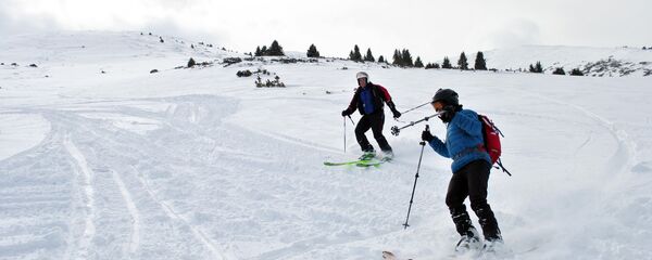 Туристы на горнолыжной базе. Архивное фото Туристы на горнолыжной базе. Архивное фото - Sputnik Кыргызстан