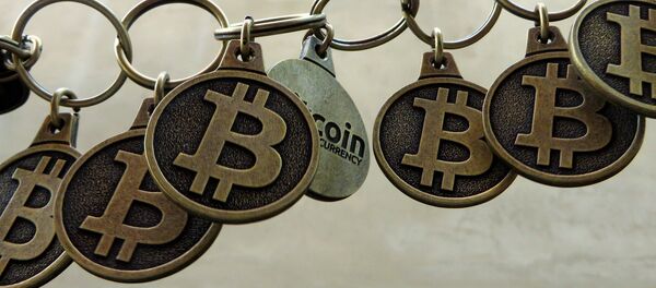 Криптовалюта (биткойн) – цифровая валюта. Архивное фото - Sputnik Кыргызстан