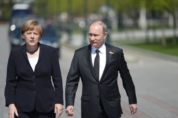 Президент Российской Федерации Владимир Путин и канцлер Федеративной Республики Германия Ангела Меркель. Архивное фото - Sputnik Кыргызстан