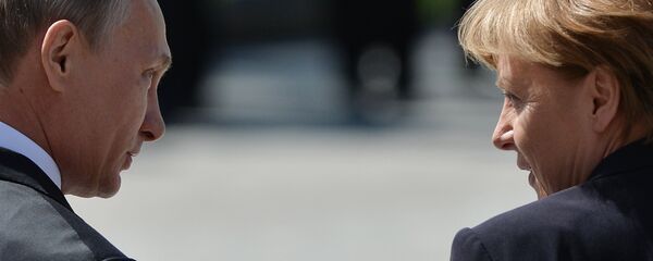 Президент Российской Федерации Владимир Путин и канцлер Федеративной Республики Германия Ангела Меркель. Архивное фото - Sputnik Кыргызстан