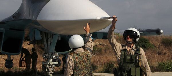 Российские пилоты самолета Су-34 на авиабазе Хмеймим в Сирии. Архивное фото - Sputnik Кыргызстан