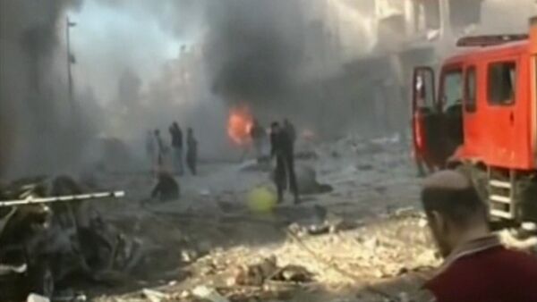 Взрыв и пожар на улицах Хомса – последствия тройного теракта в Сирии - Sputnik Кыргызстан