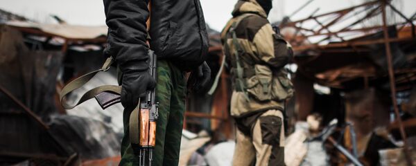 Вооруженные люди. Архивное фото Вооруженные люди. Архивное фото - Sputnik Кыргызстан