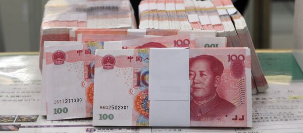 Пачка китайских юаней. Архивное фото - Sputnik Кыргызстан