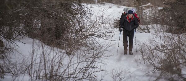 Альпинист во время восхождения. Архивное фото - Sputnik Кыргызстан