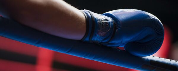 Боксер на ринге во время перерыва между раундами. Архивное фото - Sputnik Кыргызстан