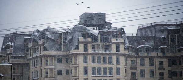 Последствия пожара в пентхаусе дома, находящегося рядом с пожарной частью на улице Элебаева в Бишкеке. Архивное фото - Sputnik Кыргызстан