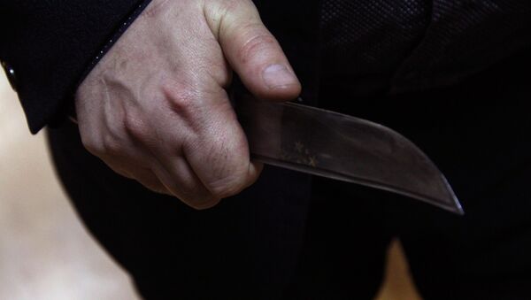 Мужчина с ножом. Архивное фото - Sputnik Кыргызстан