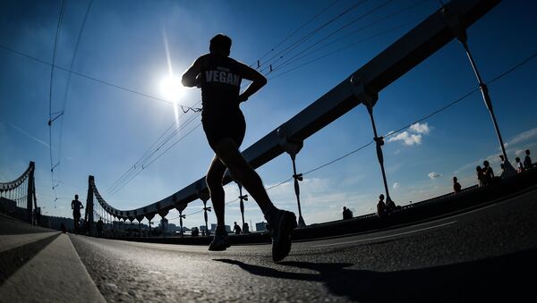 Спортсмен во время марафона. Архивное фото - Sputnik Кыргызстан