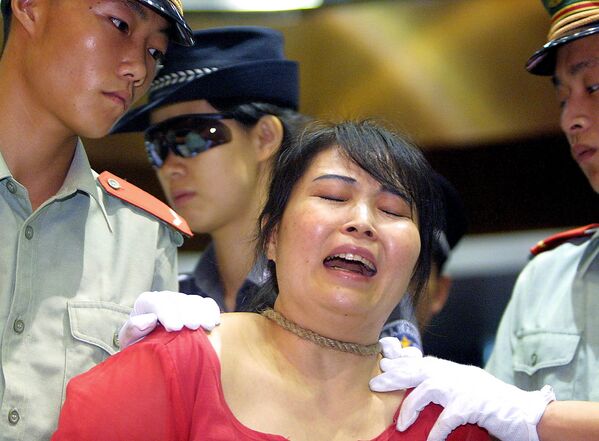 1999-жылы 27 000 юанга 200 грамм героин саткан Ванг Цьионг 2003-жылы 26-июнда Гуанчжоуда өлүм жазасына тартылган - Sputnik Кыргызстан