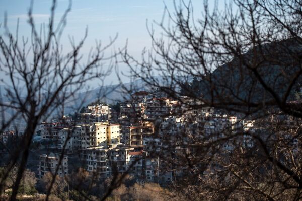 Вид на сирийский город Кесаб, находящийся неподалеку от сирийско-турецкой границы. Архивное фото - Sputnik Кыргызстан
