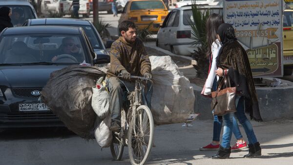 На одной из улиц Дамаска в первый день перемирия. Архивное фото - Sputnik Кыргызстан