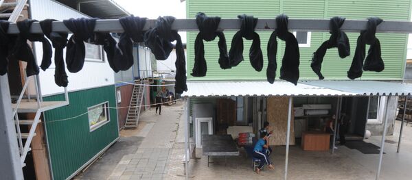 Носки на сушилке. Архивное фото - Sputnik Кыргызстан