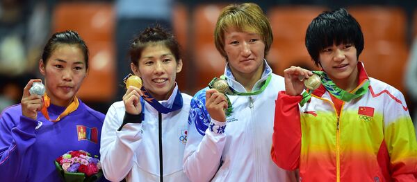 Азия чемпиону Айсулуу Тыныбекова Инчхондо коло медалы менен. Архив - Sputnik Кыргызстан