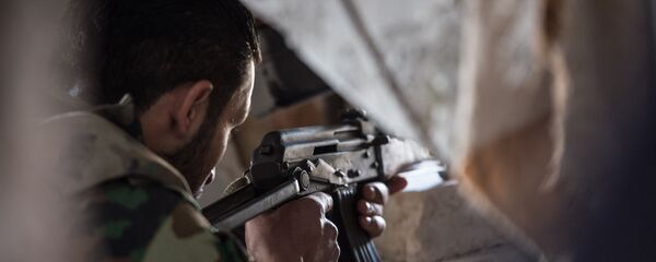 Военнослужащий Сирийской армии. Архивное фото - Sputnik Кыргызстан