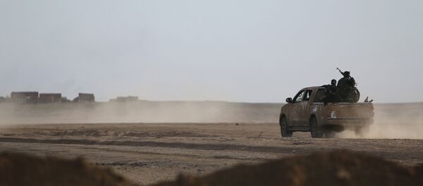 Вооруженные люди в джипе в Сирии. Архивное фото - Sputnik Кыргызстан