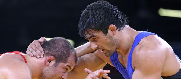 Кыргызстанский борец по греко-римской борьбе Магомед Мусаев во время олимпийских игр в Лондоне. Архивное фото - Sputnik Кыргызстан