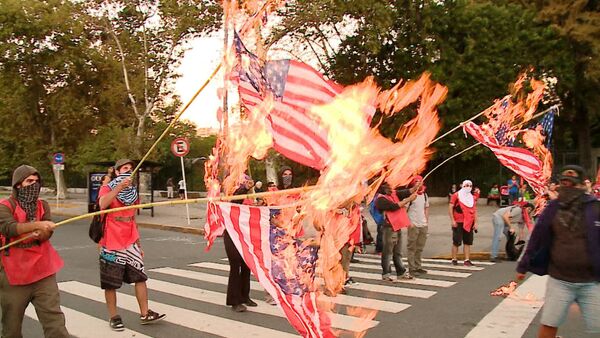 Жители Буэнос-Айреса жгли флаги США в знак протеста против визита Обамы - Sputnik Кыргызстан