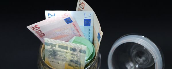 Купюры евро. Архивное фото Купюры евро. Архивное фото - Sputnik Кыргызстан