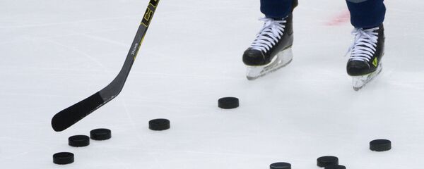 Хоккеист на тренировке. Архивное фото Хоккеист на тренировке. Архивное фото - Sputnik Кыргызстан