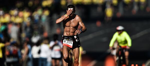 Участник марафона. Архивное фото Участник марафона. Архивное фото - Sputnik Кыргызстан