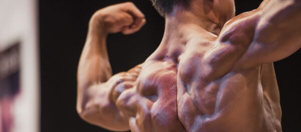 Атлет на соревнованиях по бодибилдингу. Архивное фото - Sputnik Кыргызстан