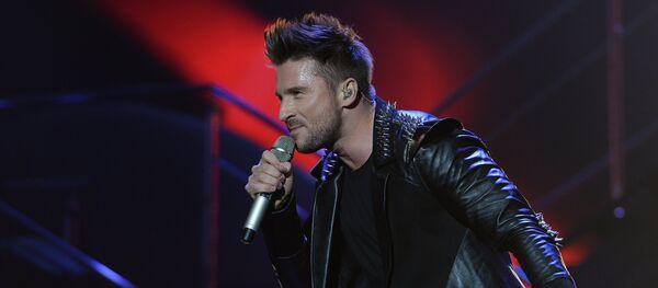 Певец Сергей Лазарев выступает на сцене во время концерта. Архивное фото - Sputnik Кыргызстан