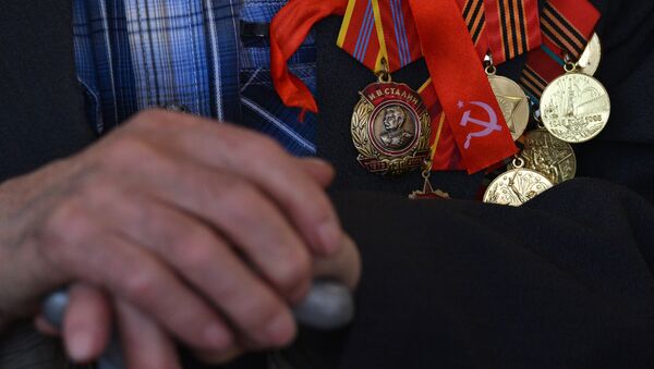 Ордена и медали на груди ветерана Великой отечественной войны. Архивное фото - Sputnik Кыргызстан
