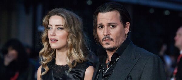 Голливудский актер Джонни Депп и его жена Эмбер Херд. Архивное фото - Sputnik Кыргызстан