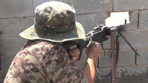 Иракские военные из пулеметов обстреляли позиции боевиков ИГ в Эль-Фаллудже - Sputnik Кыргызстан