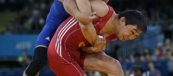 Борец греко-римского стиля Арсен Эралиев во время соревнования на олимпийских играх в Лондоне. Архивное фото - Sputnik Кыргызстан
