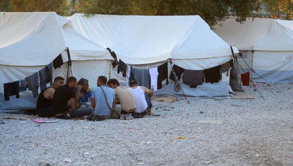 Беженцы из Сирии, Ирака, Эритреи в палаточном лагере в городе Митилини на острове Лесбос в Греции. Архивное фото - Sputnik Кыргызстан