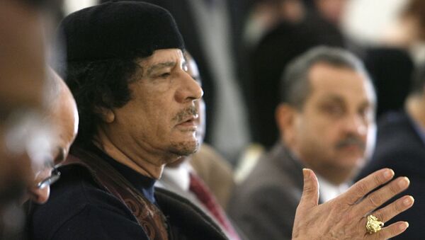 Бывший ливийский лидер Муаммару Каддафи. Архивное фото - Sputnik Кыргызстан