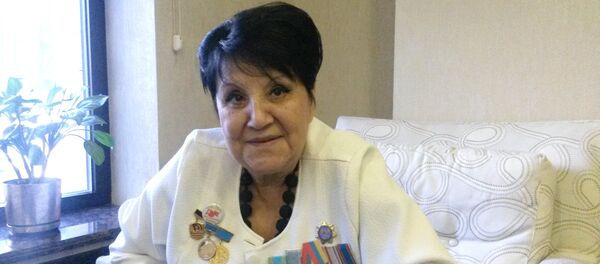 Внучка Ивана Панфилова Айгуль Байкадамова во время интервью - Sputnik Кыргызстан