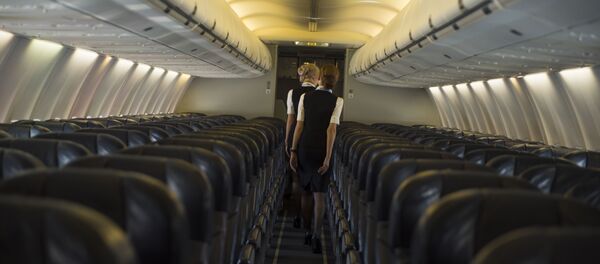 Стюардессы на самолете. Архивное фото - Sputnik Кыргызстан