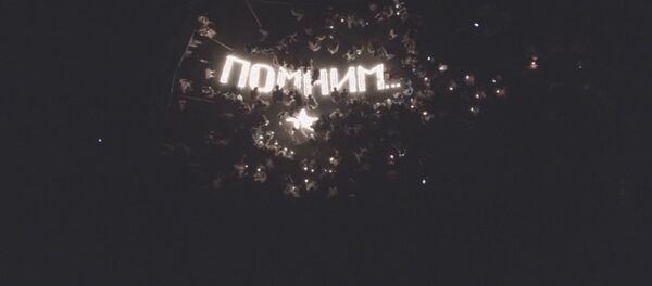 Помним —  аэросьемка тысячи горящих свечей у Вечного огня в Бишкеке - Sputnik Кыргызстан