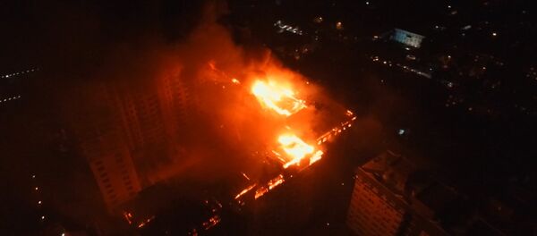 Бишкекте күйүп жаткан 12 кабаттуу үйдүн асмандан көрүнүшү. Видео - Sputnik Кыргызстан