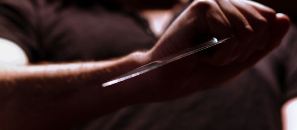 Мужчина с ножом - Sputnik Кыргызстан