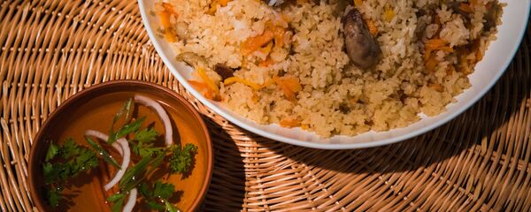 Тарелка с пловом. Архивное фото - Sputnik Кыргызстан