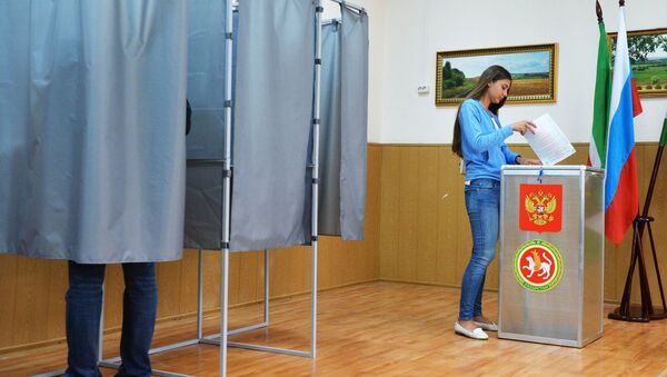 Избиратели во время предварительного голосования в Государственную Думу РФ. Архивное фото - Sputnik Кыргызстан