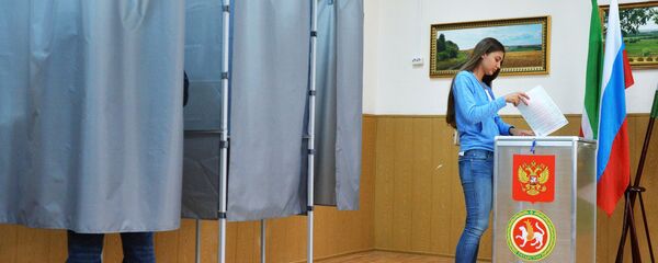 Избиратели во время предварительного голосования в Государственную Думу РФ. Архивное фото - Sputnik Кыргызстан