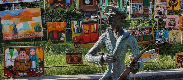 Картины уличных художников на улице столицы Грузии Картины уличных художников на улице столицы Грузии - Sputnik Кыргызстан