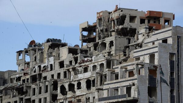 Вид на разрушенные дома в Хомсе. Архивное фото - Sputnik Кыргызстан